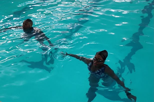 Two Aqua Jetz students building water confidence together during a lesson